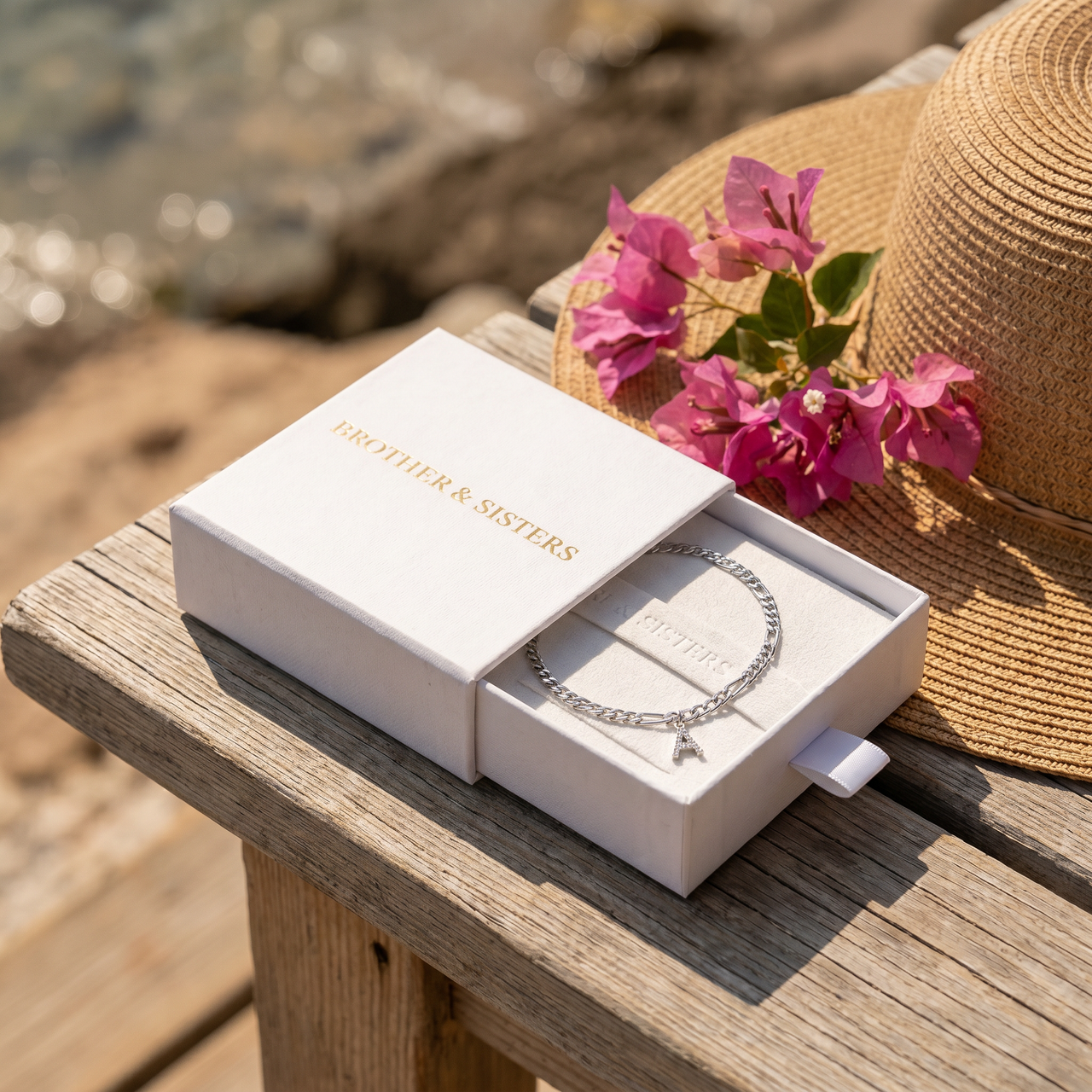 Pavé Initial Anklet silver in Brother & Sisters gift box on beach
