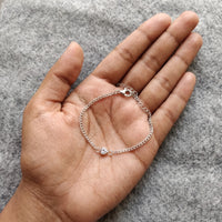 Thumbnail for Heart Bond Matching Bracelet Set in Silver — her bracelet resting in an open palm