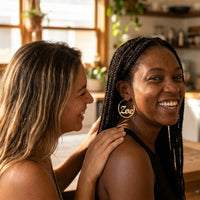 Thumbnail for Custom Name Hoop Earrings in Gold, the moment the gift is given between two friends | SKU: name-hoop-gold-30-mm