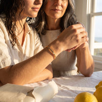Thumbnail for Gold engraved cuff bracelet offered as a gift between mother and daughter | SKU: 4214557-gold-color