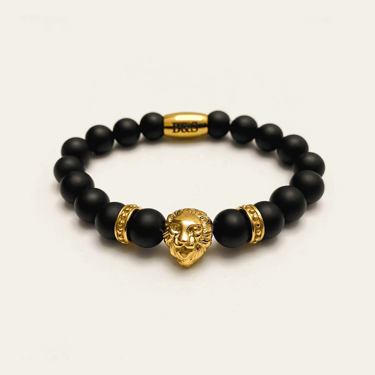Gold Lion & Black Stones Bracelet – studio packshot | Brother & Sisters | SKU: 20712286-gold-XS-14-15, 20712286-gold-S-16-17, 20712286-gold-M-18-19, 20712286-gold-L-20-21, 20712286-gold-XL-22-23