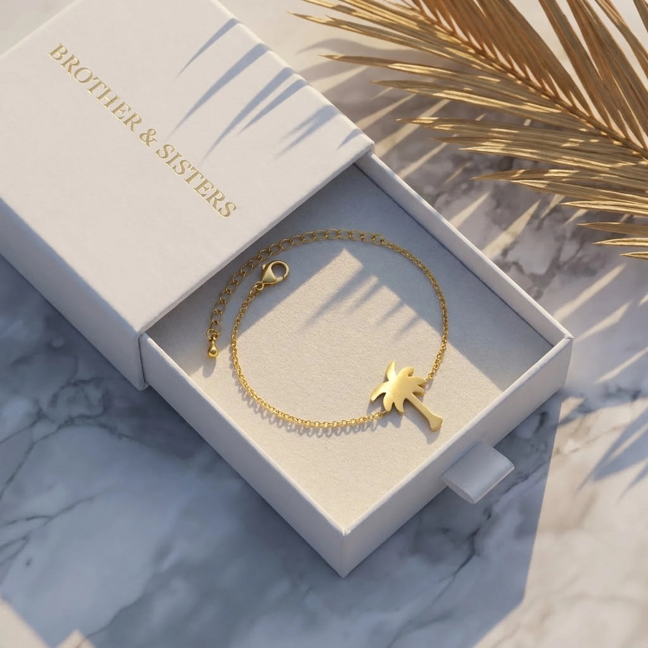 Gold charm bracelet in the Brother & Sisters gift box | SKU: 7819407-gold-color