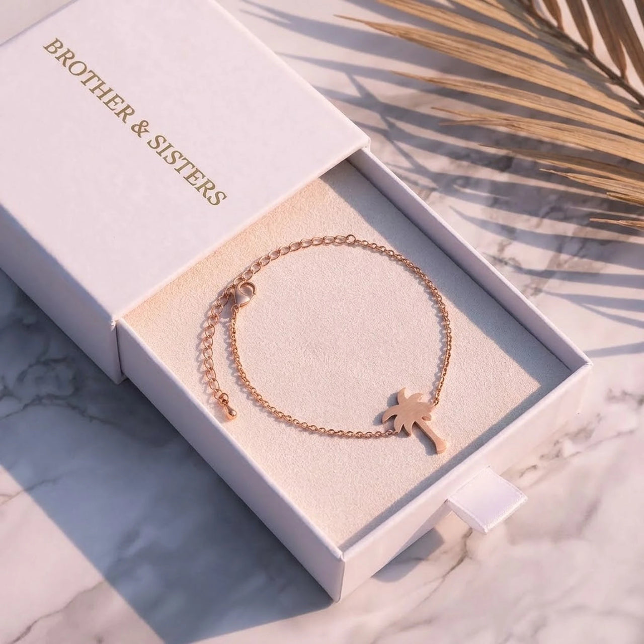 Rose gold charm bracelet in the Brother & Sisters gift box | SKU: 7819407-rose-gold-color