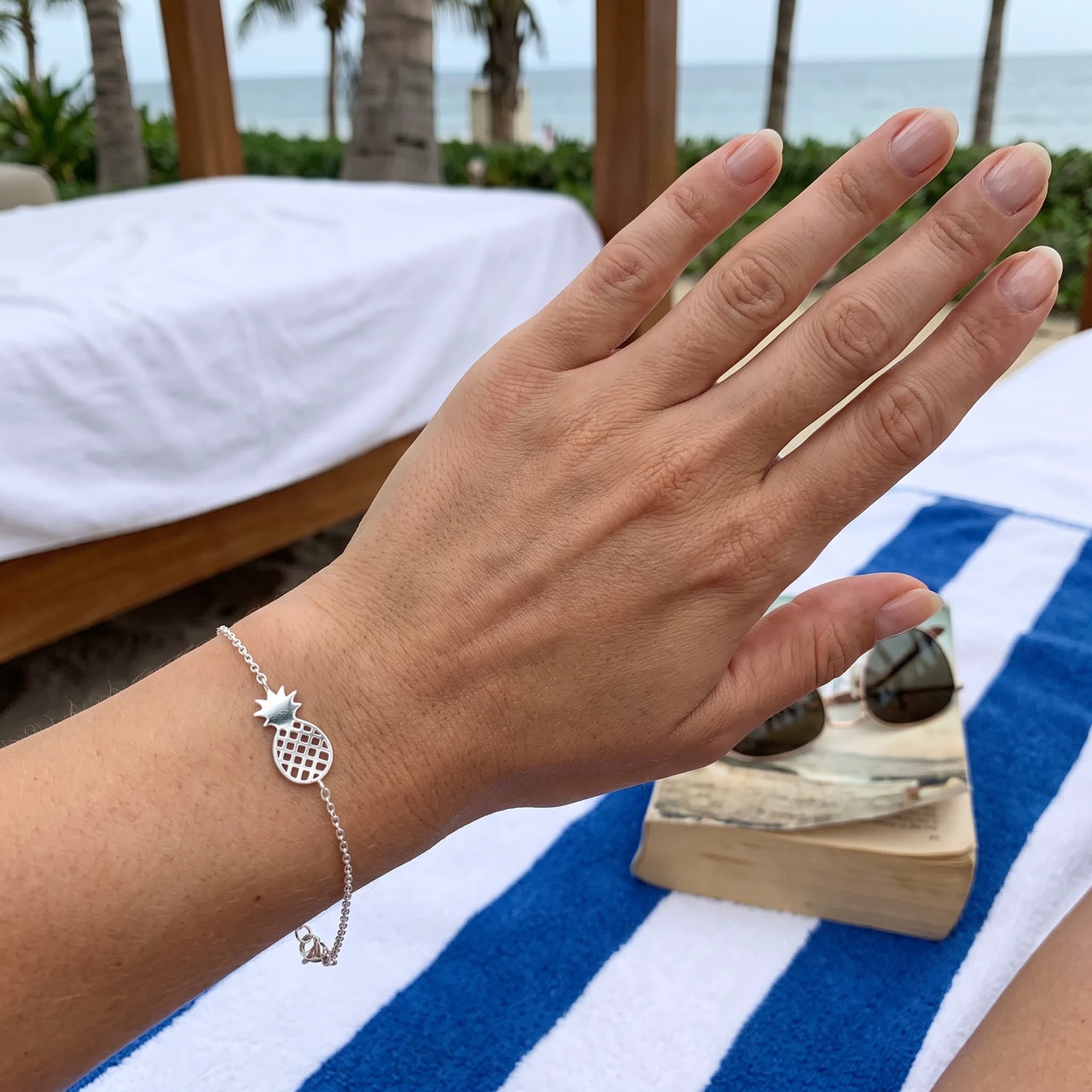 Silver charm bracelet worn, showing its real size | SKU: 9178613-white-gold