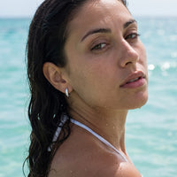 Thumbnail for Silver huggie hoop earrings worn in the sea, waterproof stainless steel with water drops | SKU: 22023999-rhodium