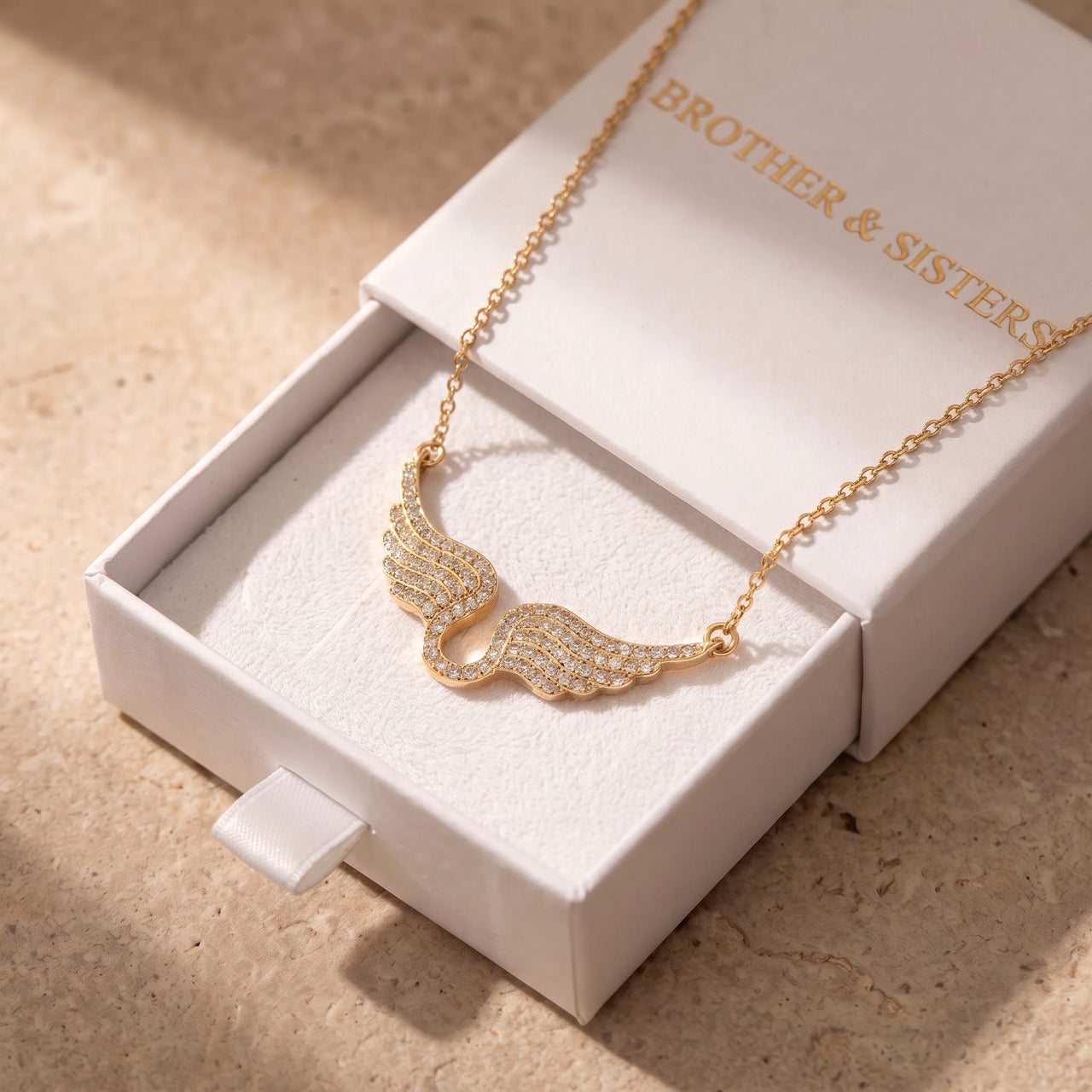 The gold necklace in the Brother & Sisters gift box | SKU: 42002-gold