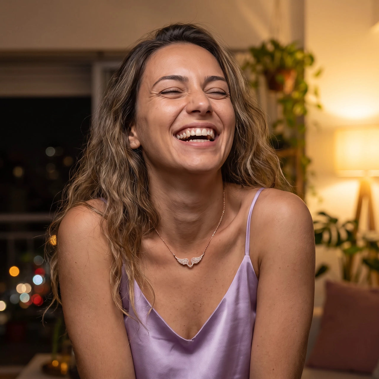 Woman laughing, wearing the rose gold necklace | SKU: 42002-rose-gold