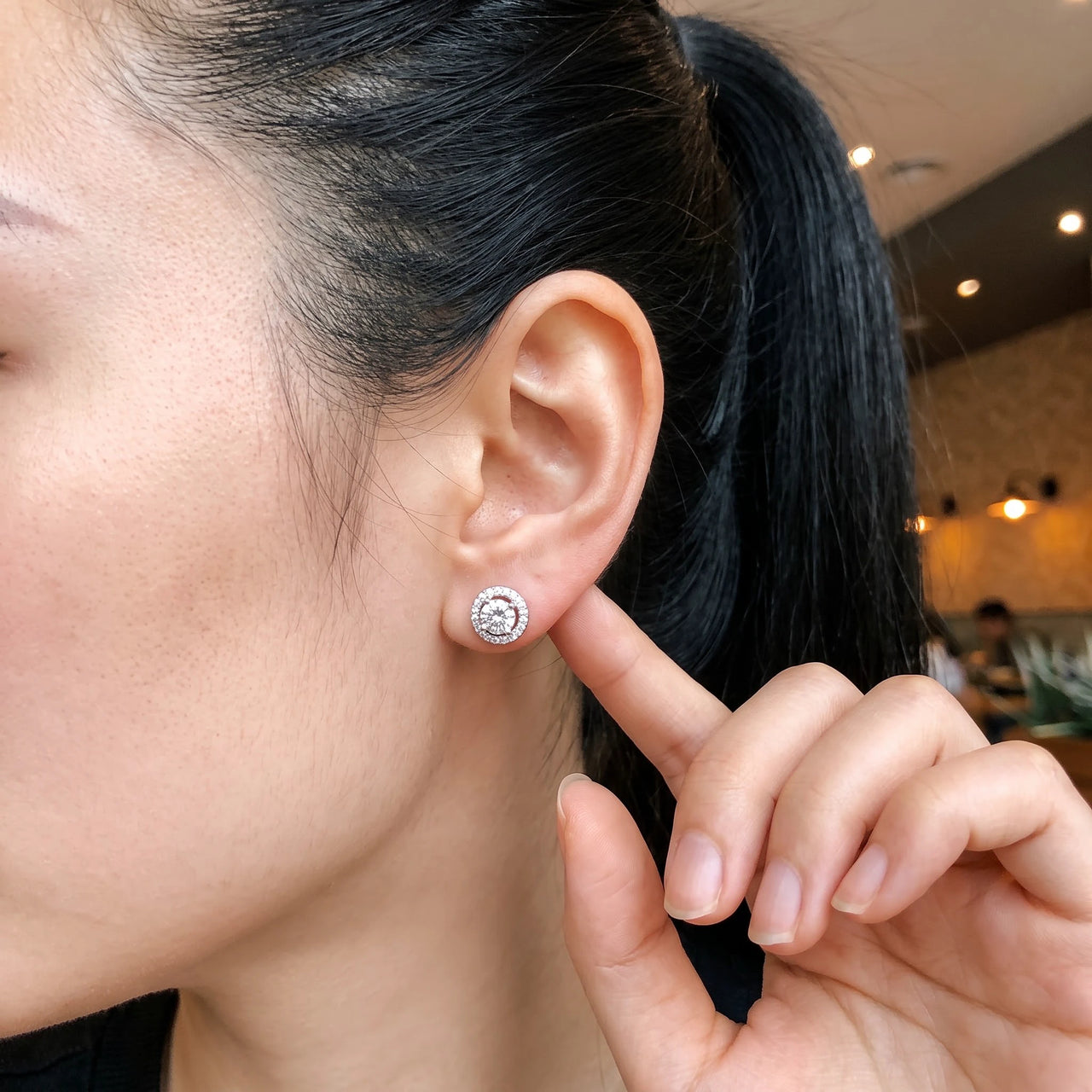 Silver stud earrings worn, showing its real size | SKU: 19991927