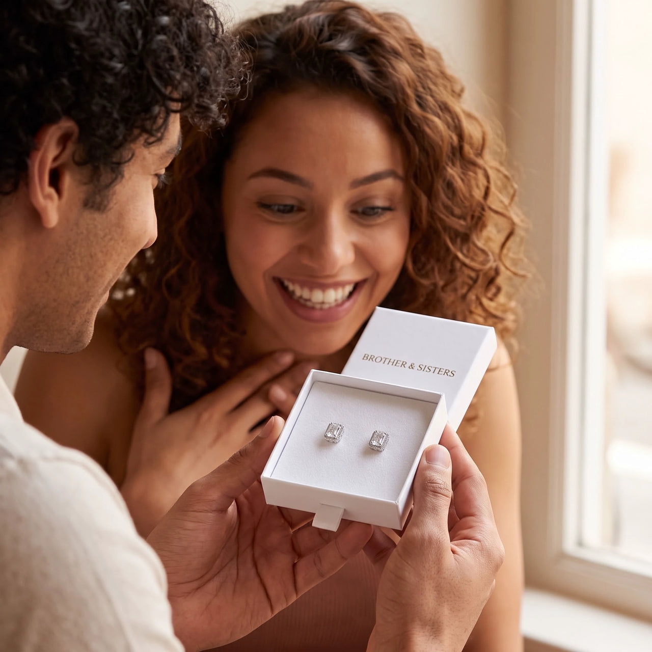 He surprises her with the silver ring in its gift box | SKU: 22683128