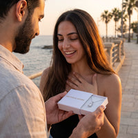 Thumbnail for He surprises her with the silver necklace in its gift box | SKU: 22559056