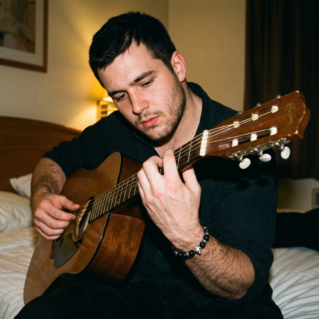 White Gold Lion & Black Stones Bracelet – worn while playing guitar | Brother & Sisters | SKU: 20712286-silver-XS-14-15, 20712286-silver-S-16-17, 20712286-silver-M-18-19, 20712286-silver-L-20-21, 20712286-silver-XL-22-23
